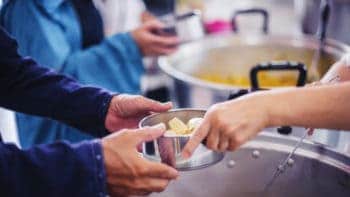 Volunteers serving food